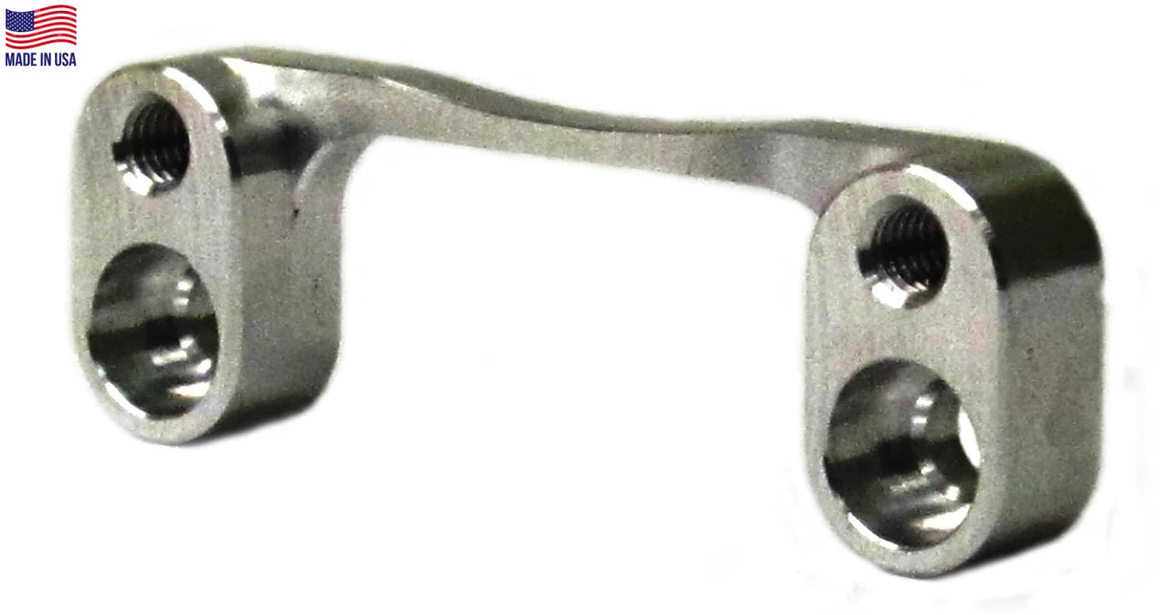 Single angled product photo of raw silver billet aluminum coil relocation bracket for ARC 6607-PH flywheel showing both mounting ends with threaded holes and made in USA flag in corner on a white background