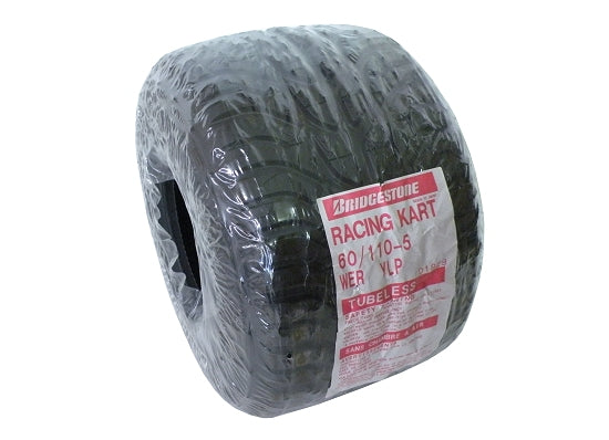 Image of Bridgestone YNP600 11x600x5 rain tire with visible water-channeling grooves