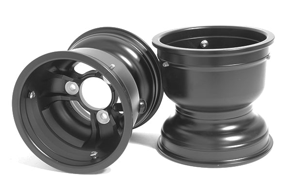 Two black Douglas 130x5 low volume magnesium kart wheels, one showing the three-lug Euro hub face and center hole, the other showing the deep low-volume barrel and outer lip on a white background