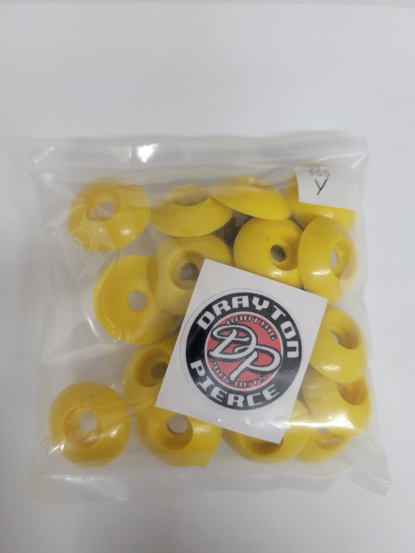 Yellow plastic body mount kit for visible kart fastening