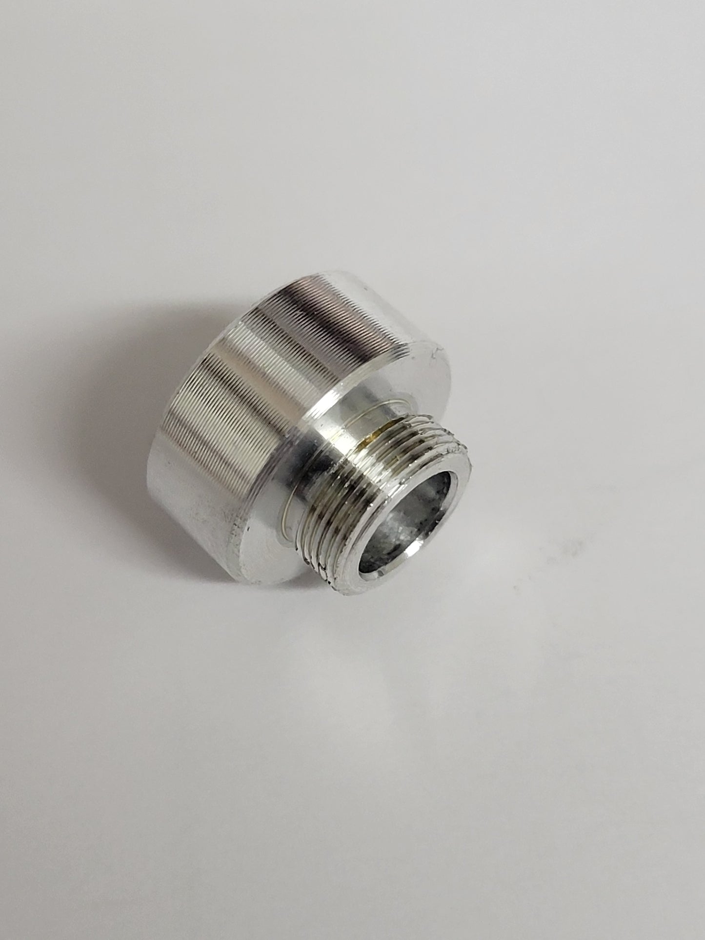 Silver aluminum PMI port plug for gauge