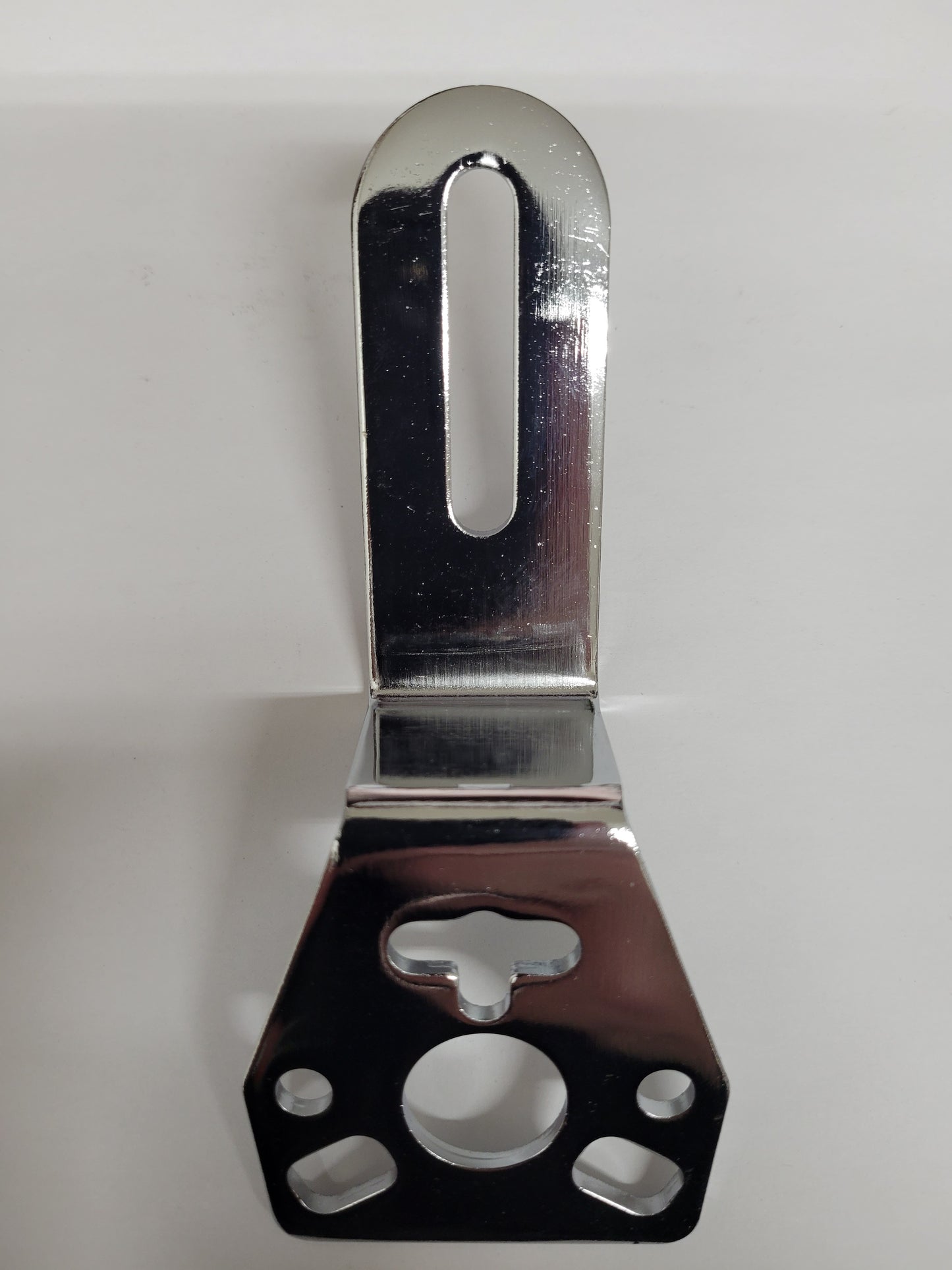 Shiny chrome steel gauge mount attached to kart steering wheel