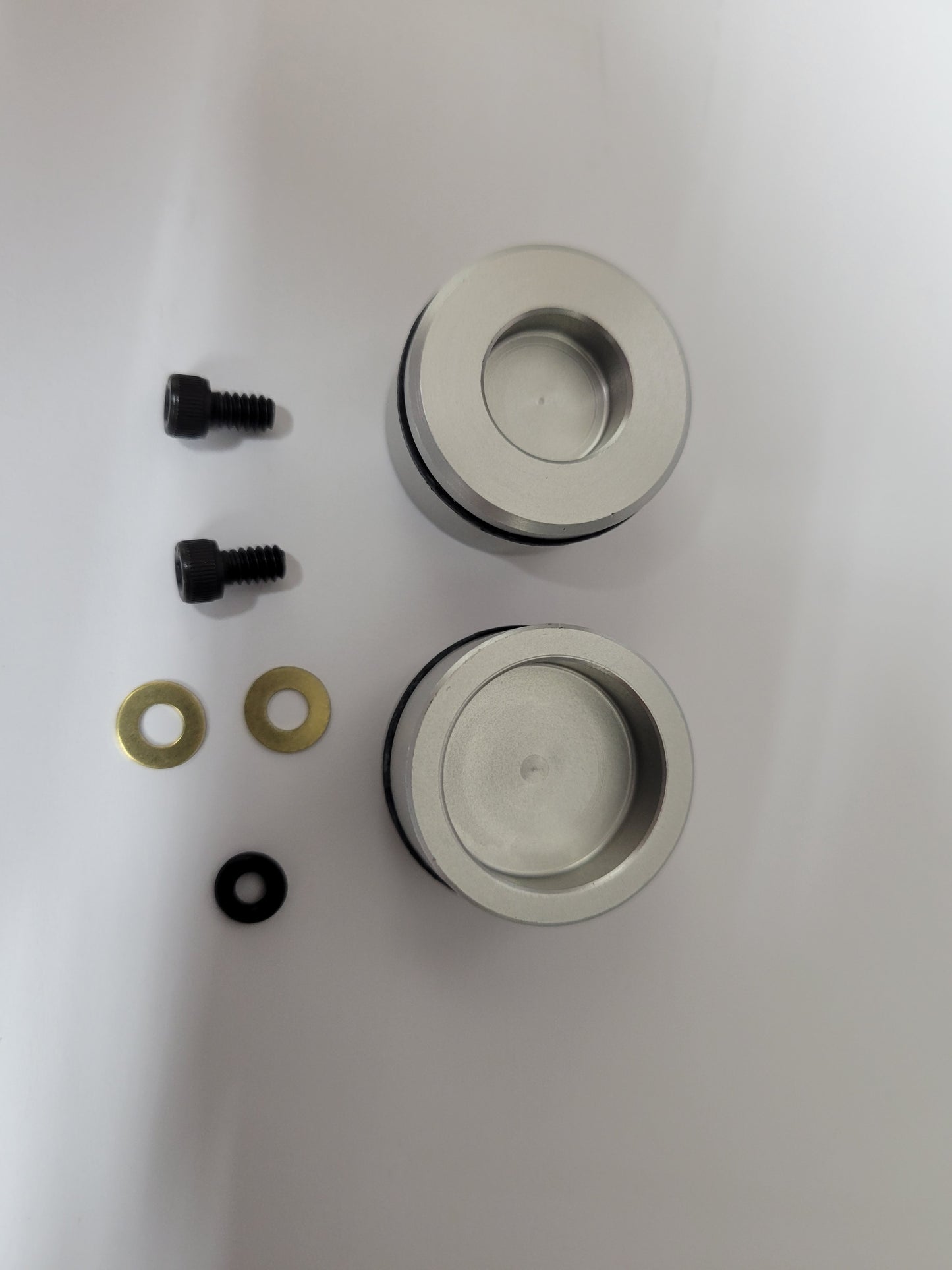 Caliper rebuild kit with pistons, O-rings, and bleeder screws for quarter midget