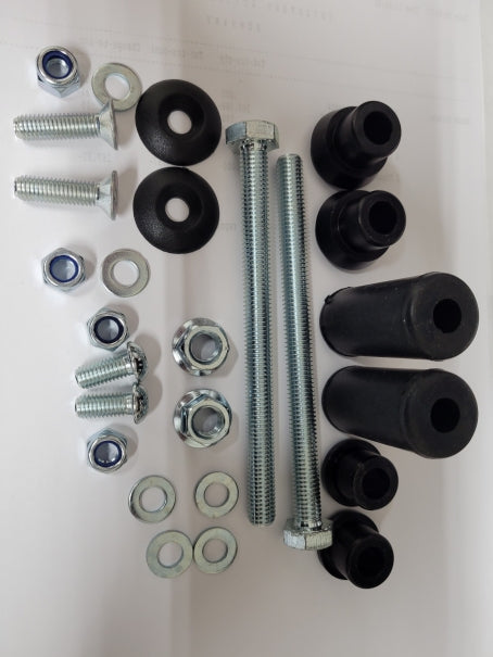 Close-up of 30mm rear bumper hardware kit components including inserts and bolts