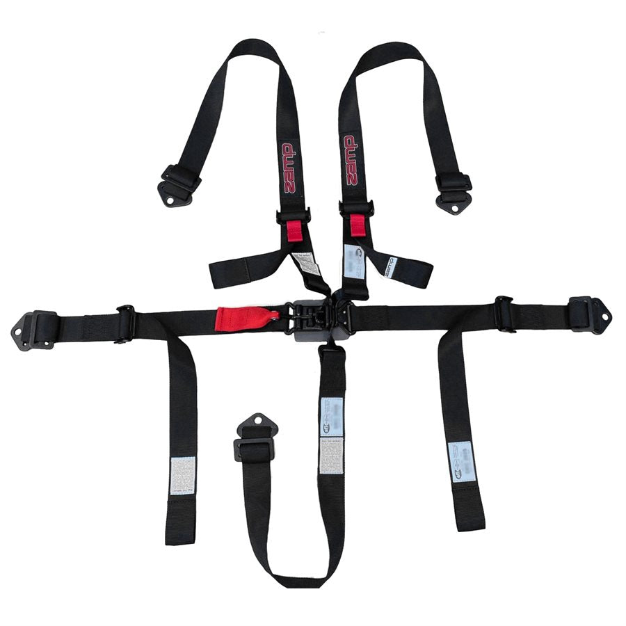 Overhead view of Zamp Racing youth black 2 inch 5 point SFI 16.2 seat harness fully spread out showing shoulder straps with red logos, central latch and lock buckle with red tab, lap belts, adjusters, separate crotch strap and steel hardware on a white background