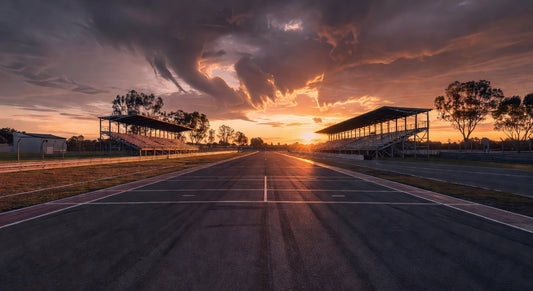 Sunset landscape of empty paved karting sprint track and pits