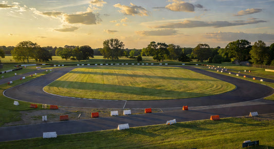Midwest kart track landscape at golden hour, ideal for 4-cycle racing.