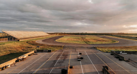 Midwest kart track landscape with pits and grandstands