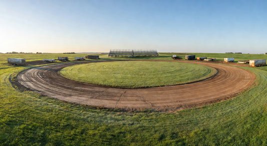 Midwest dirt oval kart track on a clear day