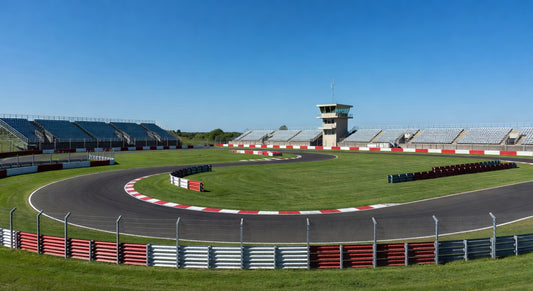 Wide view of an empty paved kart track ready for race day action.