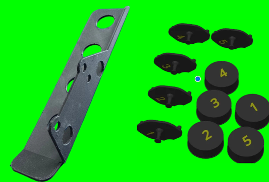 Picture of a light weight carbon infused nylon chainguard built to fit on a LO206. It shows the adjustable holes to adjust the angle of chain guard. Also five numbered carb caps for a lo206/animal, and 5 exhaust port covers that are numbered. 