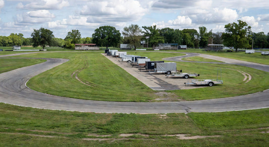 Wide view of paved kart sprint track in Midwest setting