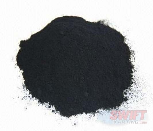 Close-up of a small pile of dark gray WS2 tungsten disulfide nano lubricant powder on a light surface.