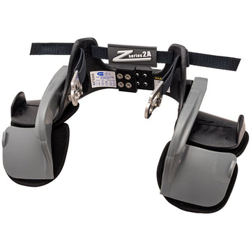 Z-Tech Series 2A black and gray head and neck restraint front view with central logo plate, dual gray arms, adjustment screws and belt channels on a white background