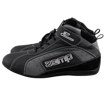 Black Zamp ZK-20 kart racing shoe in side profile view showing perforated gray panel, embroidered Zamp logo, and slim silhouette on a white background