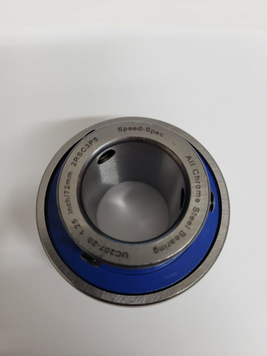 Close-up of UC-207 Speed-Spec 1.25 inch axle bearing with blue rubber seals