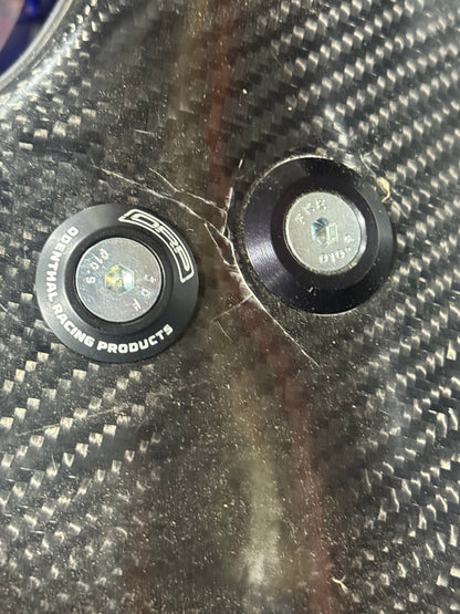 8mm low profile seat washer installed on carbon fiber kart seat next to standard bolt showing low stack height