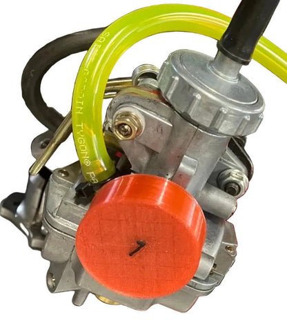 LO206 karting Carburetor with a red cap on the intake. Red cap is numbered with the number 1 on it in black. 