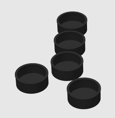 Five carburetor caps upside down that shows the end that goes over the end of the carburetor cap, to cap it off on a white background.