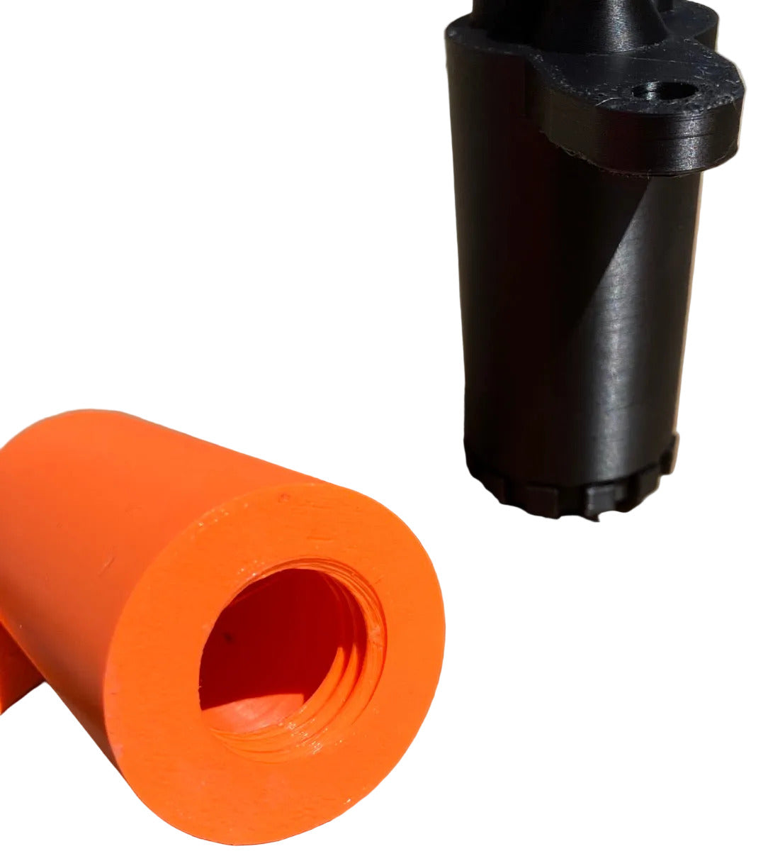 Showing the bottom of the overflow tank is threaded and orange in color, the black in color tank shows the side where the mounting bracket is that mounts on a lo206 engine.