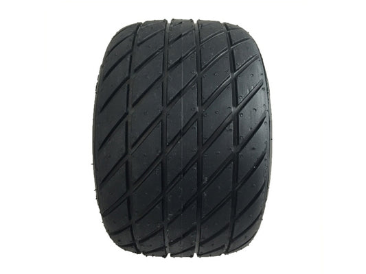 Close-up view of TX22 11x550x5 treaded kart tire showcasing deep tread pattern