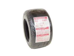 Closeup of YDS450 Bridgestone 10x450x5 kart racing tire on white background