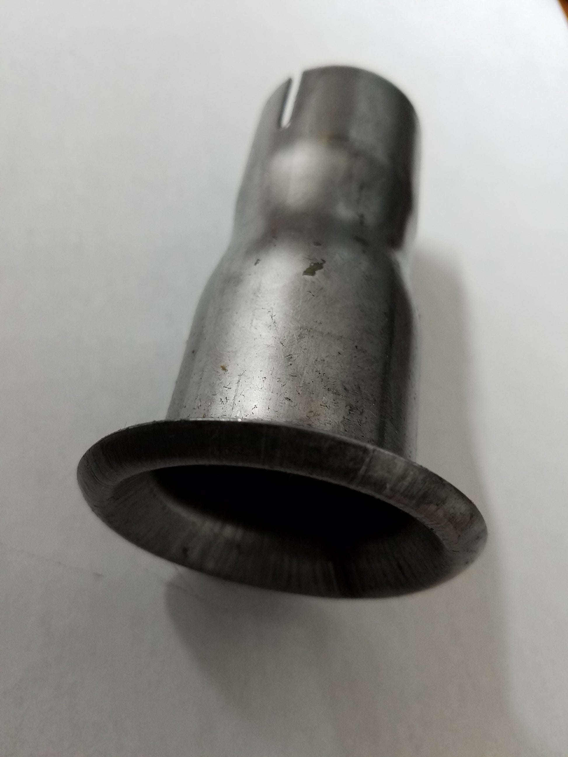 Flared RLV trumpet end for exhaust silencer