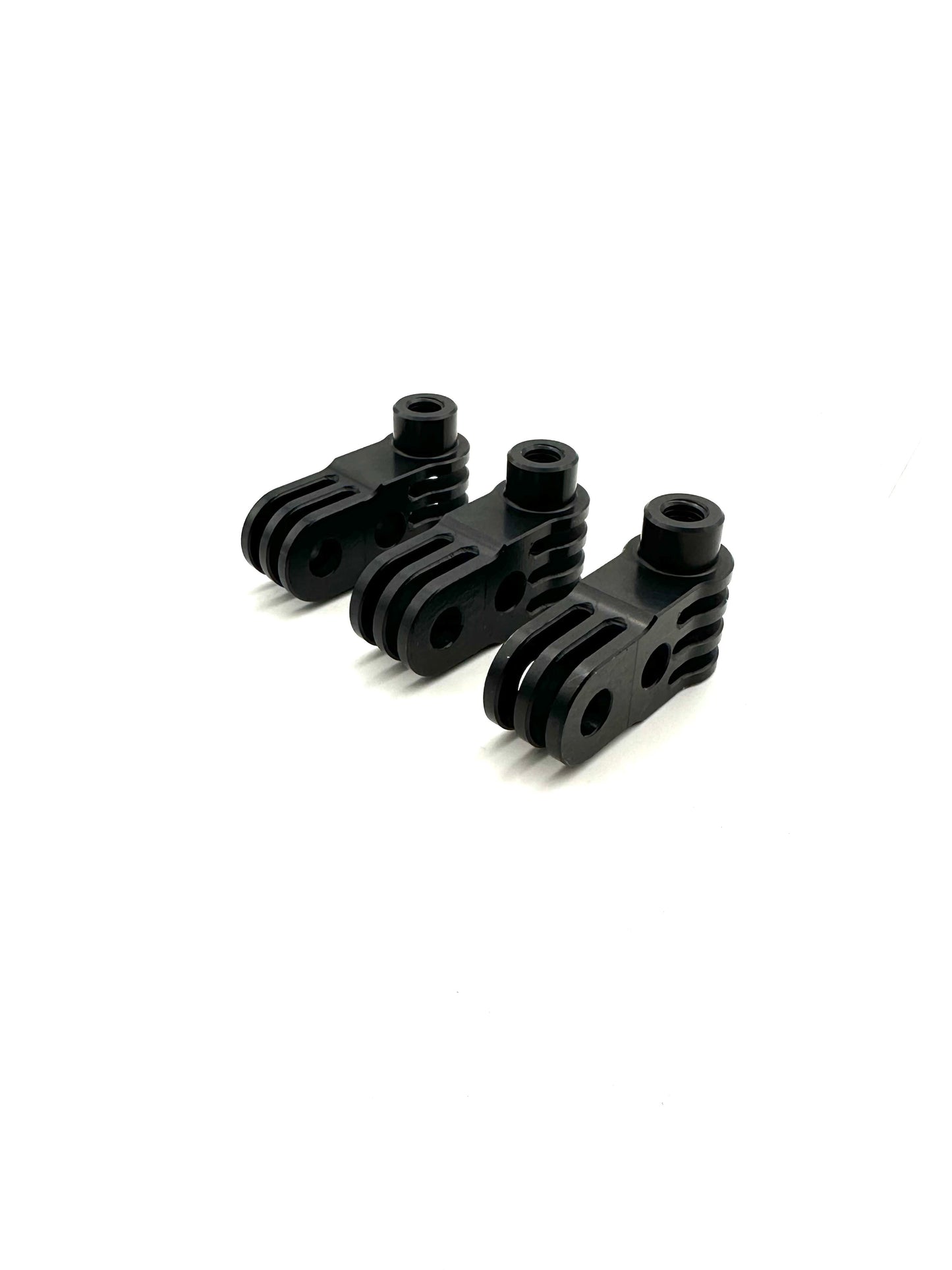 Three black EZGP 90 degree pivots showing slotted clevis ends drilled holes and threaded bosses on a white background
