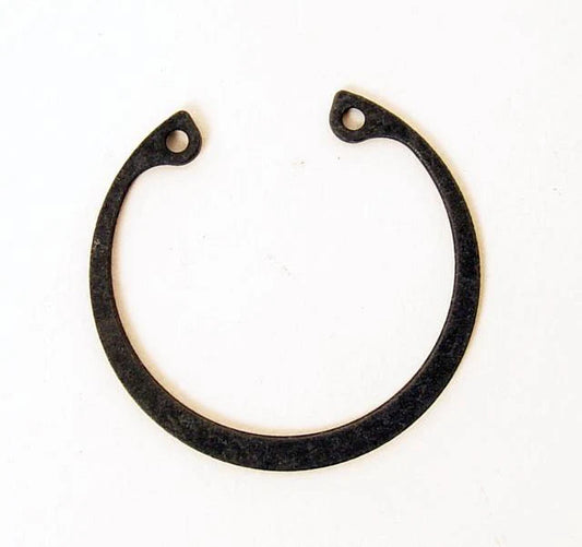 Black steel snap ring for third bearing EN upright with drilled tabs on a white background