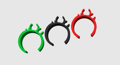 Green, black, and red PETG kart frame clips viewed from above showing the fuel line and cable slots on a gray background
