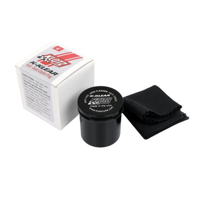 Klotz K-Klear anti-fog lens gel kit with black jar, blue gel and black microfiber cloth on a white background