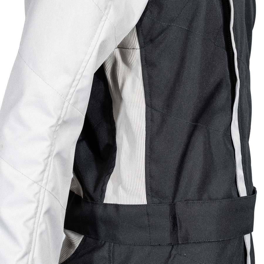 Side detail of ZK-40 kart race suit showing white quilted sleeve, mesh lining at armhole, white piping and adjustable black waist belt on a white background
