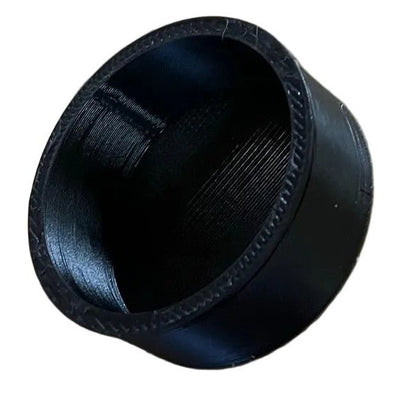 Carburetor cover cap on a white background, showing the side that slides onto carb