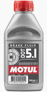 Translucent grey plastic bottle with bright red cap and black label showing Motul DOT 5.1 brake fluid, a brake rotor graphic, barcode, and 500 ml capacity marking on a white background