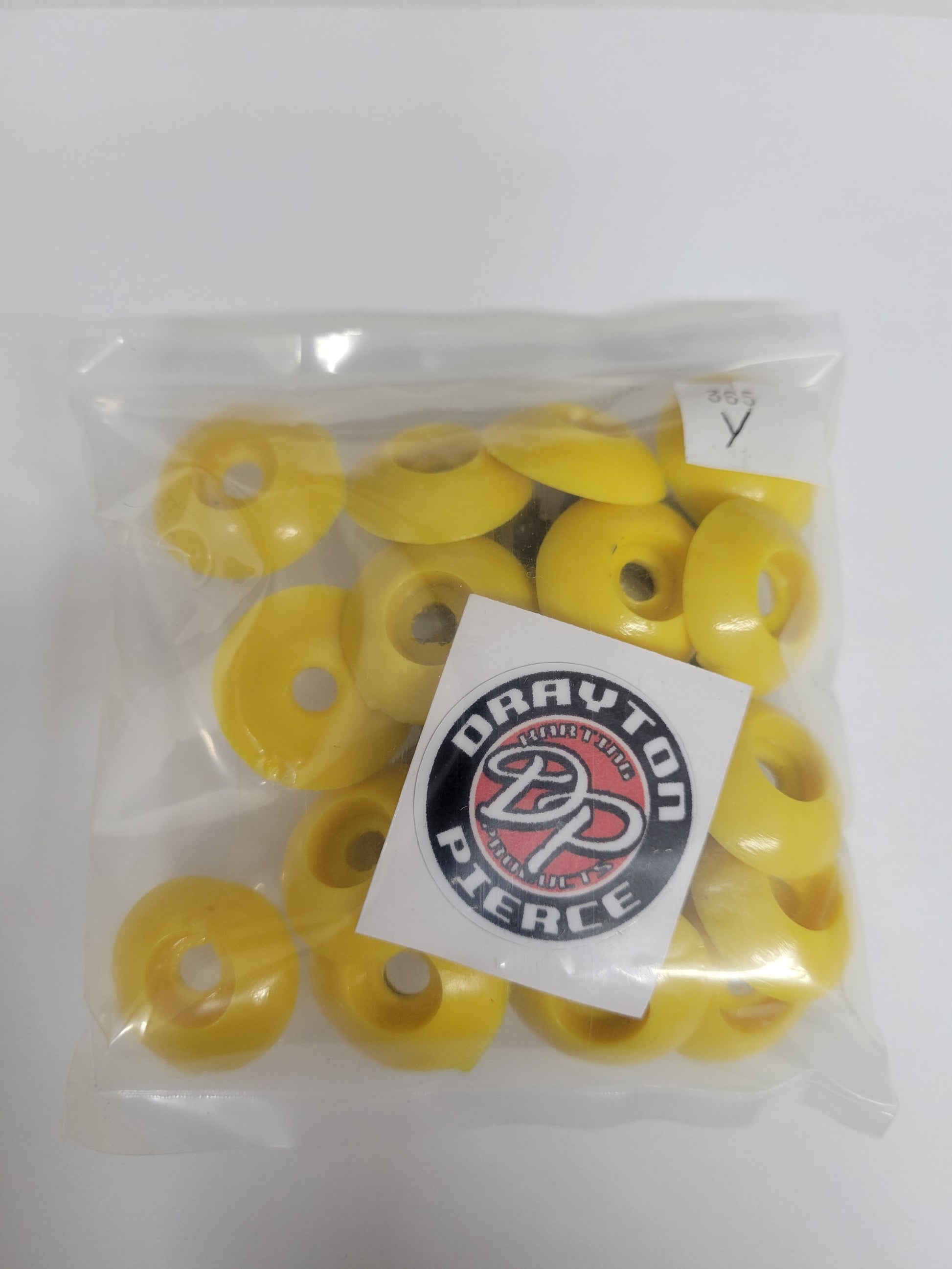 Yellow plastic body mount kit for visible kart fastening