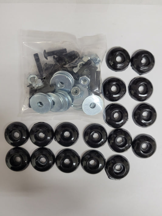 Black plastic body mounting kit components for karts
