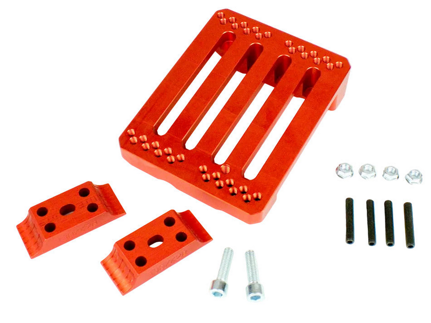 Odenthal Code Red LO206 one-piece engine mount showing top slot pattern and lightening pockets machined into red anodized aluminum on white background