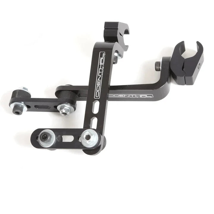 Black aluminum 90 degree exhaust arm for Rotax Max with machined linkage, clevis ends with bolts, slotted adjustment holes and Odenthal Racing logo on a white background