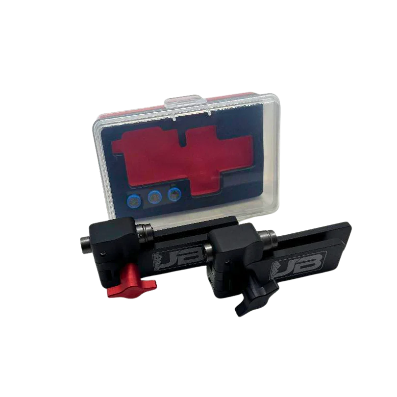 Complete JB Race Works Smoker Chain Aligner kit with tool, spare batteries, and custom foam-fitted plastic storage case on black background