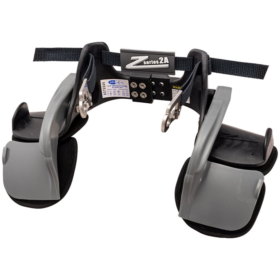 Z-Tech Series 2A black and gray head and neck restraint front view with central logo plate, dual gray arms, adjustment screws and belt channels on a white background