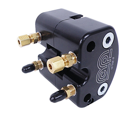 Adjustable billet brake caliper with black pads and brass fittings, open view