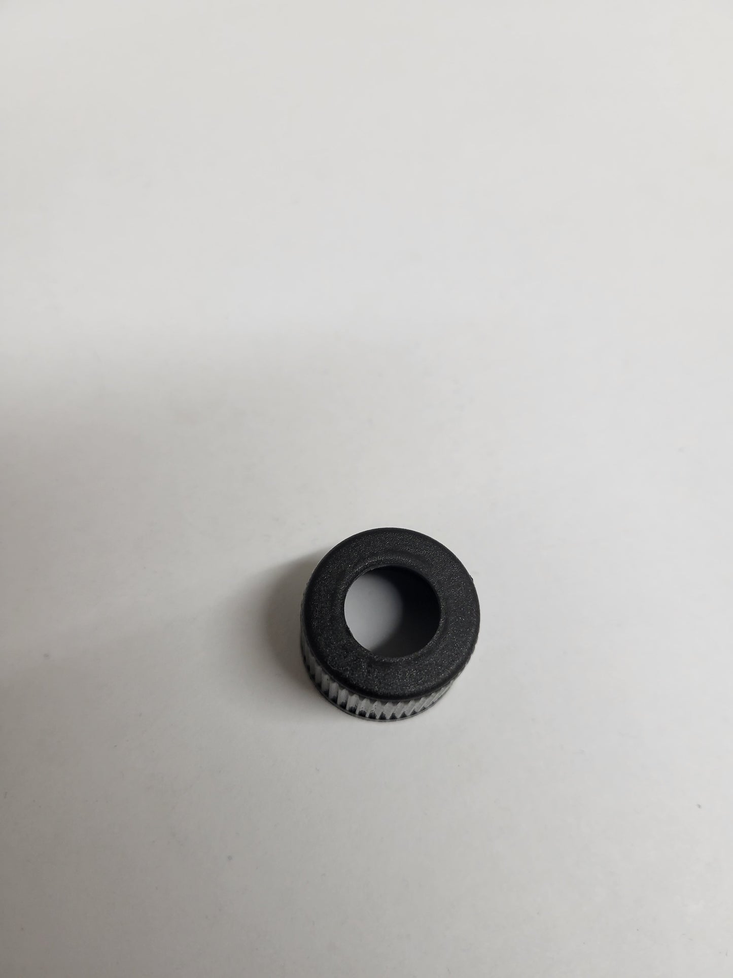 Black PUFT outlet fitting cap for kart fuel protection