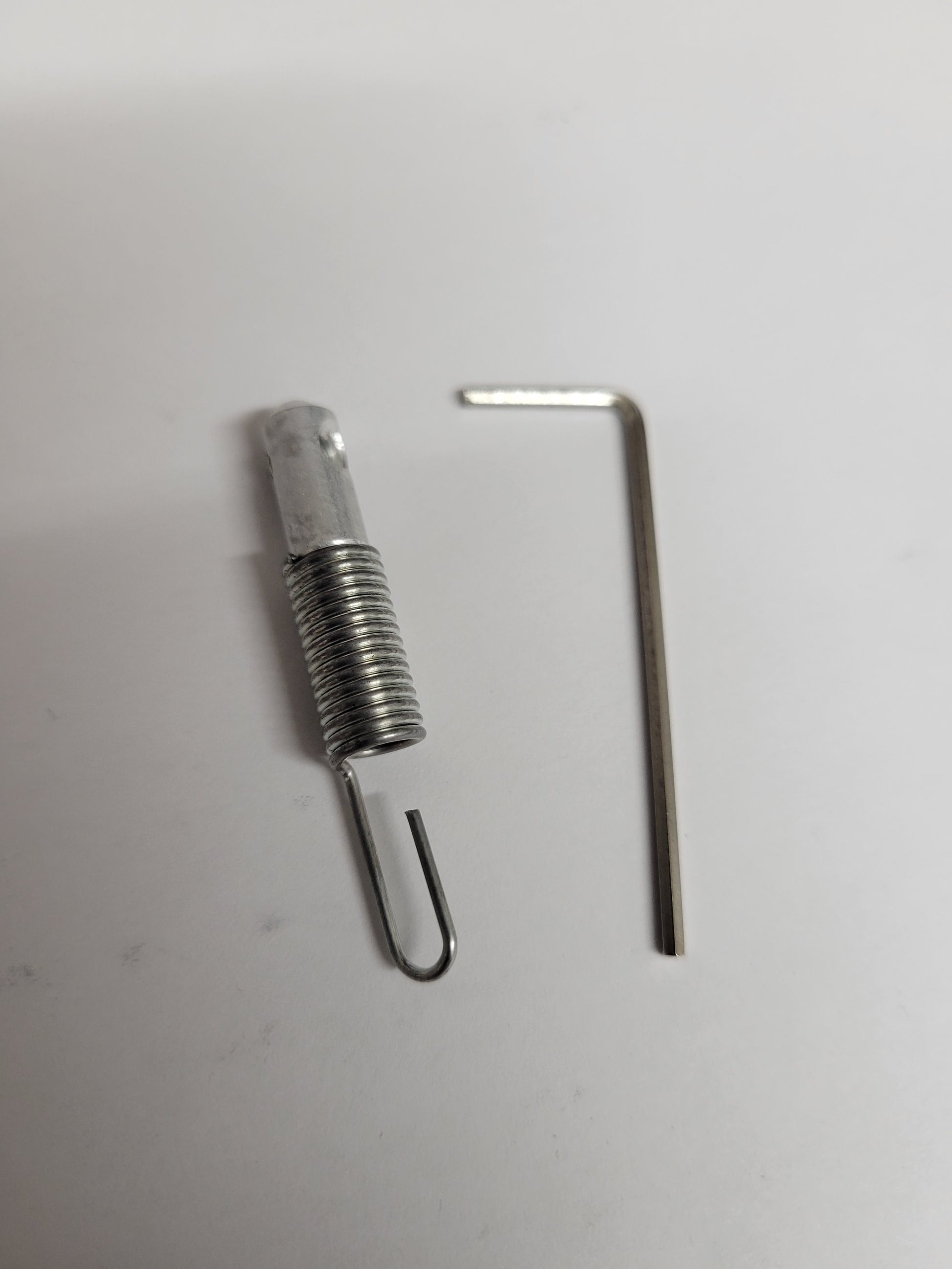 Throttle clevis assembly with protective spring for karts