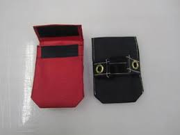 Black velcro pouch holding kart transponder device