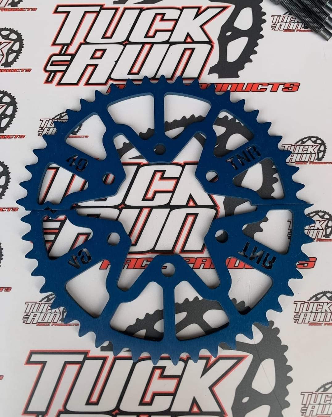 Blue anodized Tuck-n-Run mini sprocket for kart racing drive-line
