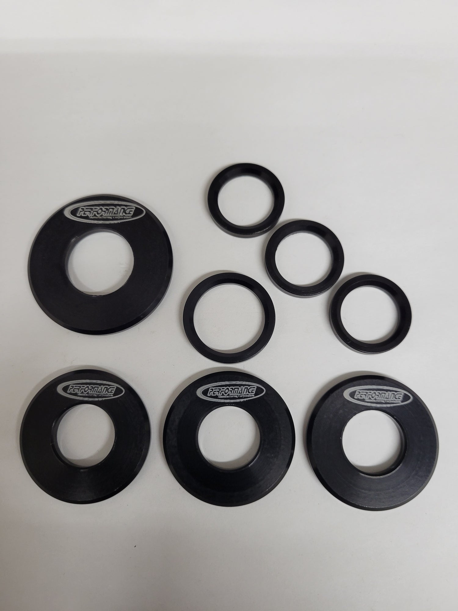 Set of bearing shields for stepped kart spindles