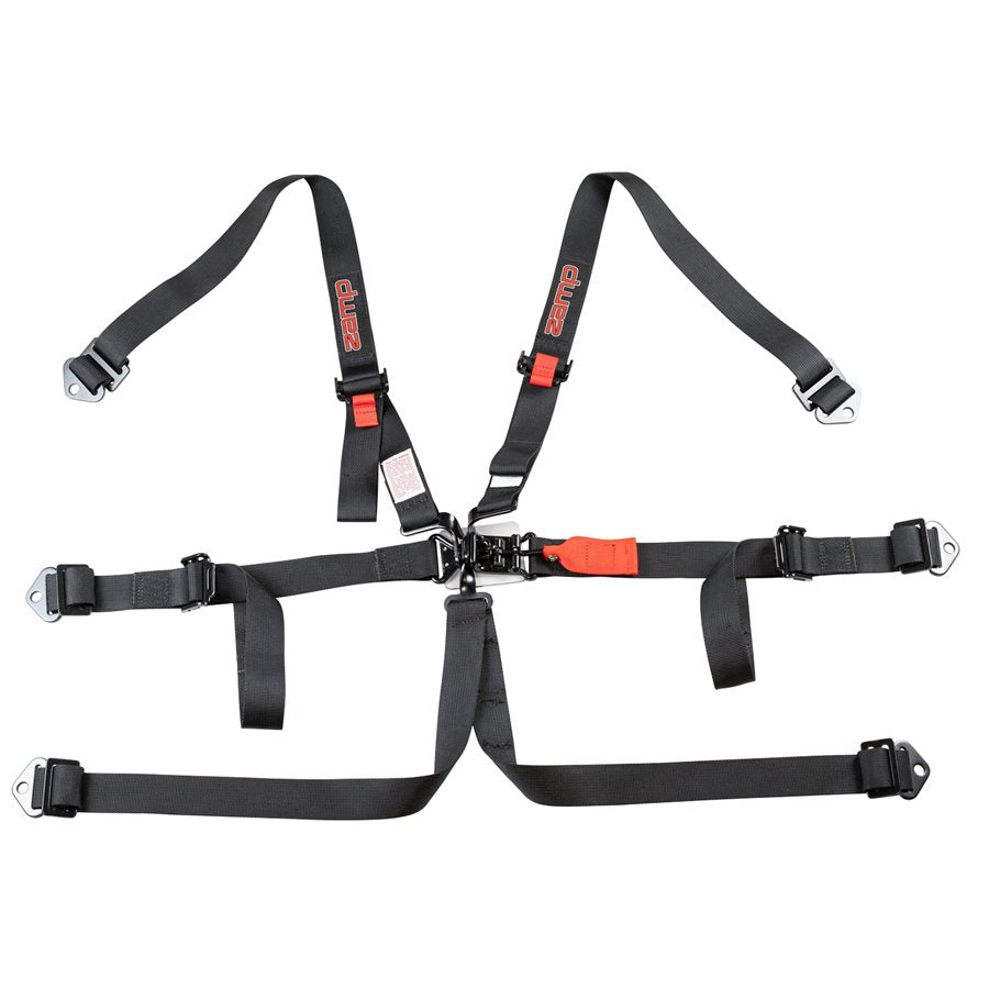 Overhead view of Zamp 6 point kart harness detailing the SFI 16.1 tag, belt stitching, and attachment points on a white background