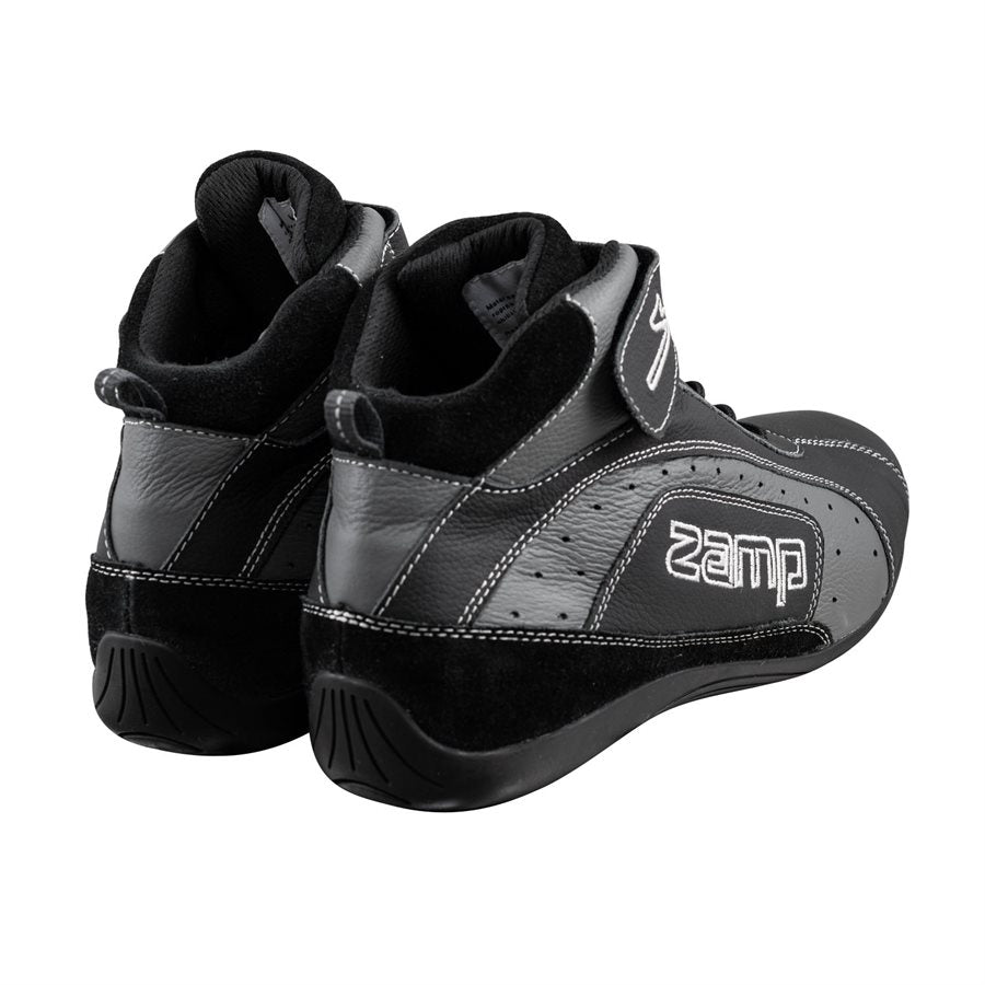 Rear view of black Zamp ZK-20 kart shoes pair displaying padded collar, suede heel counter, pull tabs, and tread on a white background