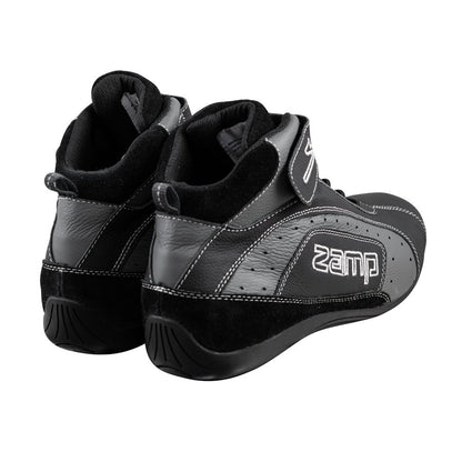 Rear view of black Zamp ZK-20 kart shoes pair displaying padded collar, suede heel counter, pull tabs, and tread on a white background